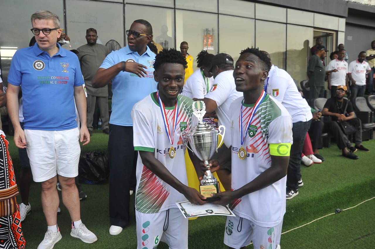 Champions With the Trophy